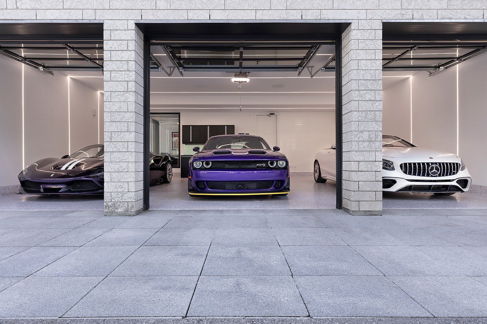 3 cars parked in garage