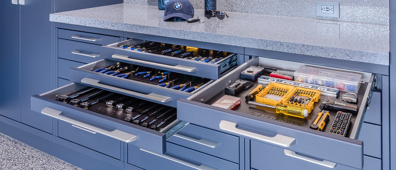 Garage Cabinetry Systems open drawers by Garage Living