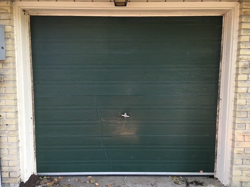 closed green garage door