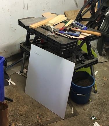 workbench with wood and tools