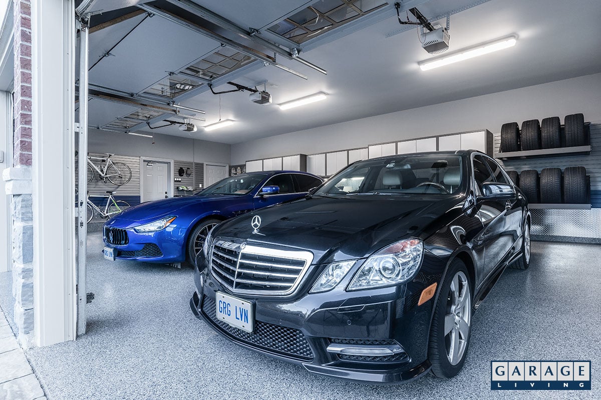 black and blue cars parked in luxury garage