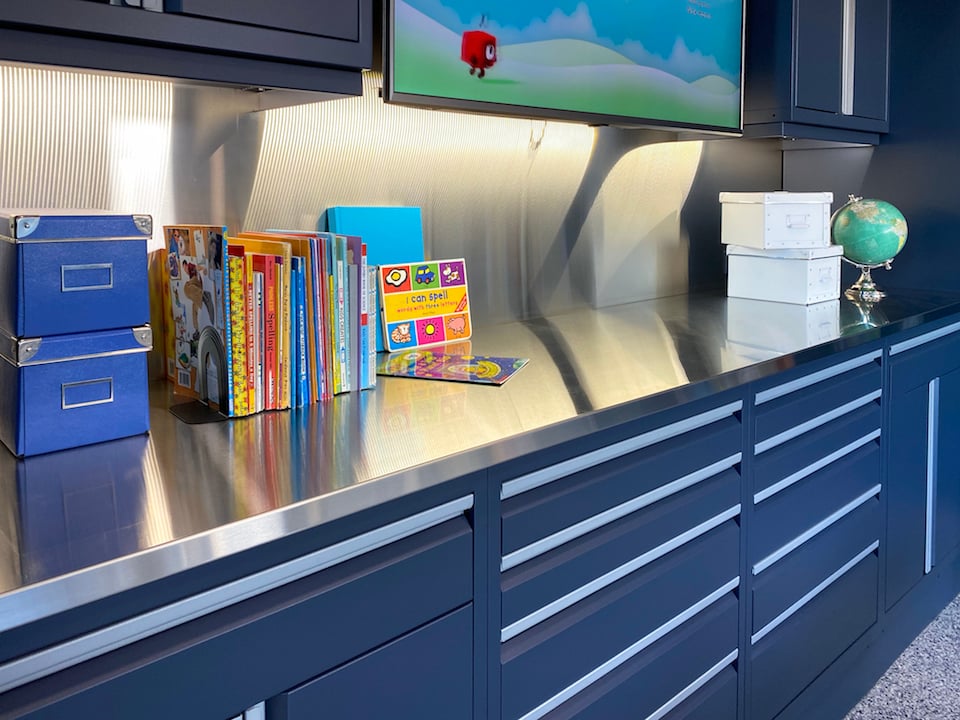 cabinet countertop with school books