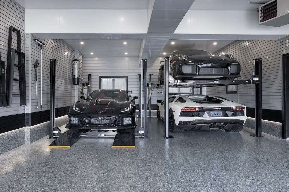double car lift with parked cars