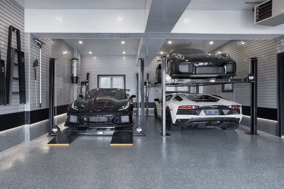double car lift with luxury cars