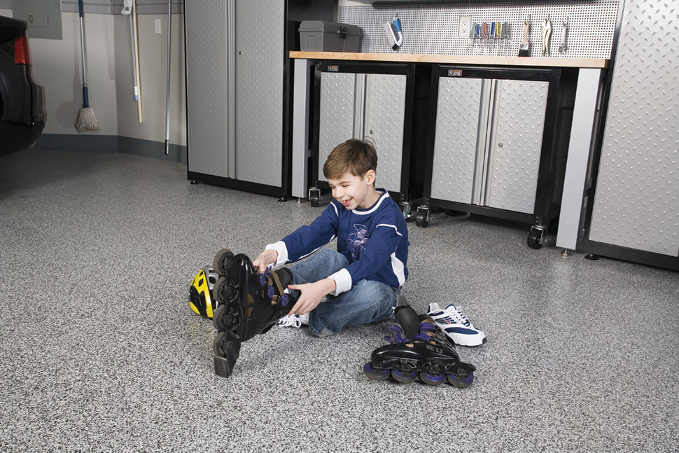 garage storage for kids, child putting on rollerblades