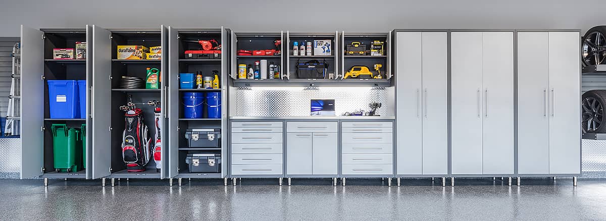 long row of garage cabinets open
