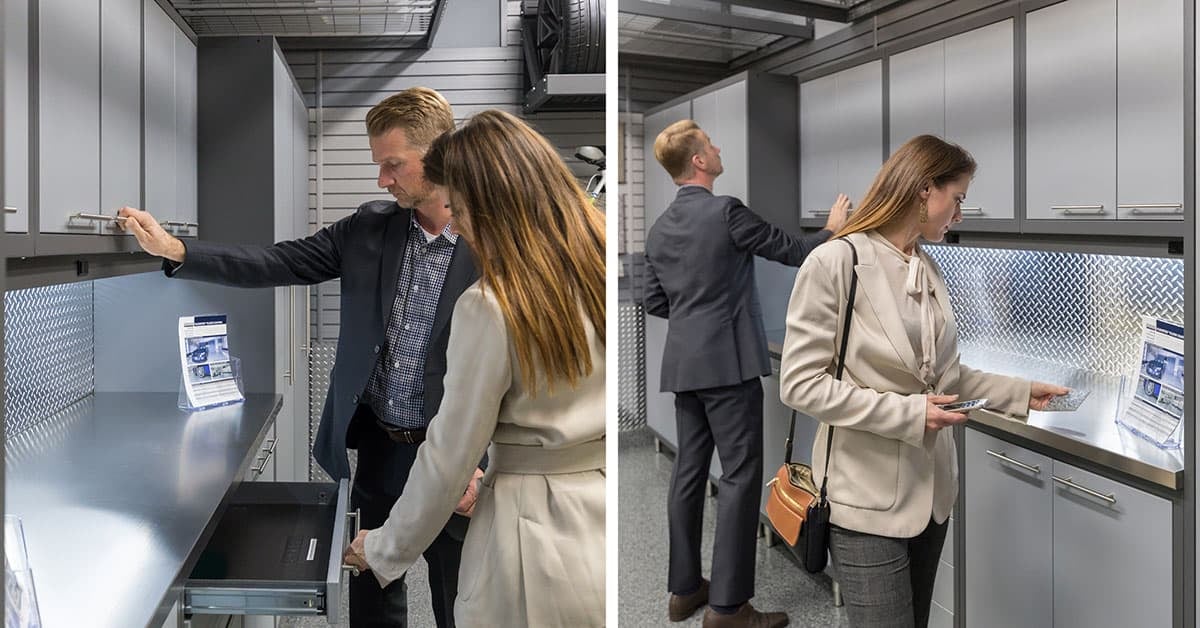 man and woman shopping for garage cabinets in a local showroom