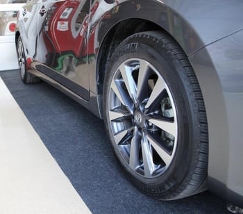 garage floor protection car parked on mat