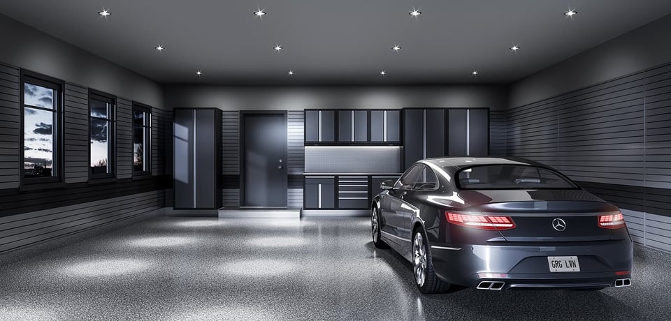 Charcoal grey Merceds parked in custom garage with dark decor.