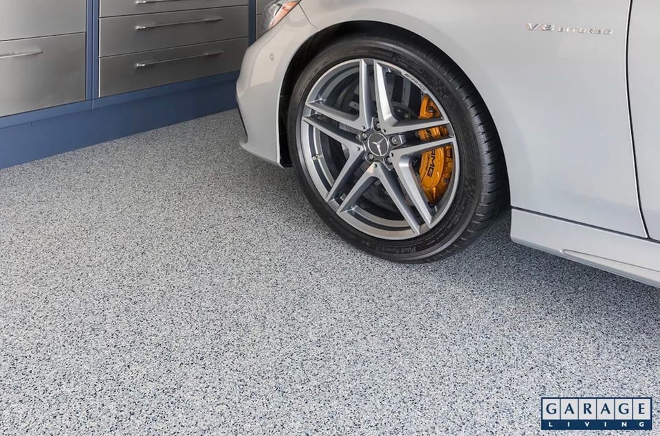 white car on new garage floor