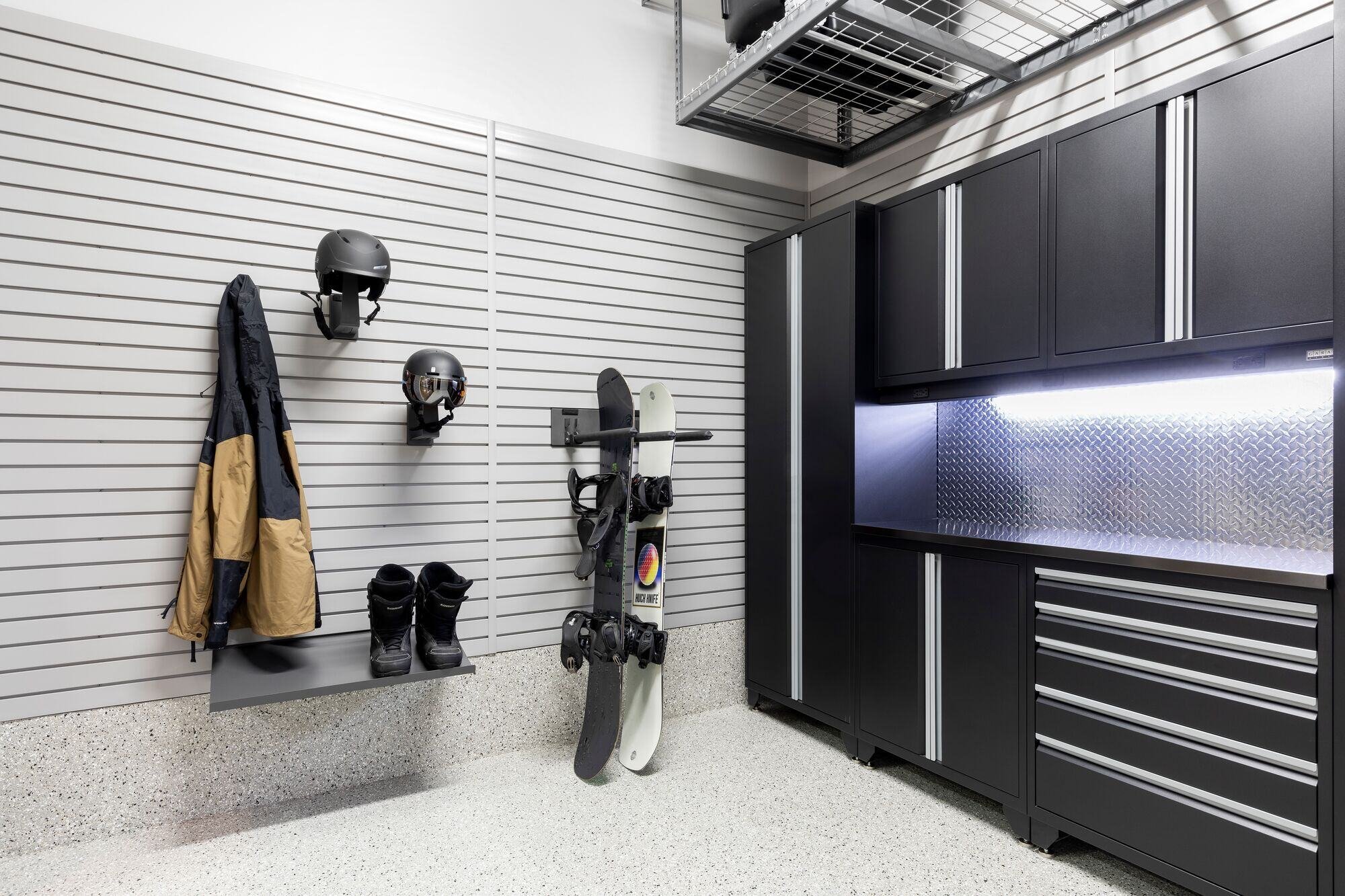 LINEA slatwall garage storage system for organizing boards, boots and helmets - Garage Living