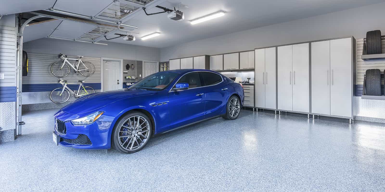 blue maserati in garage 