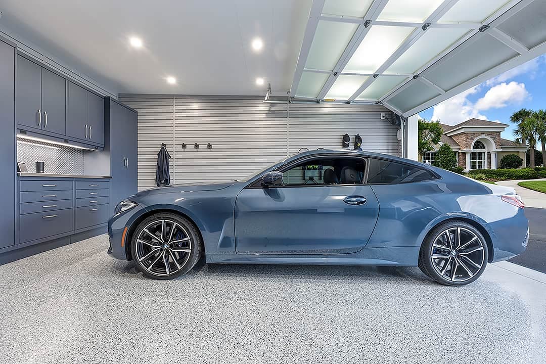 Blue BMW in clean clutter-free garage