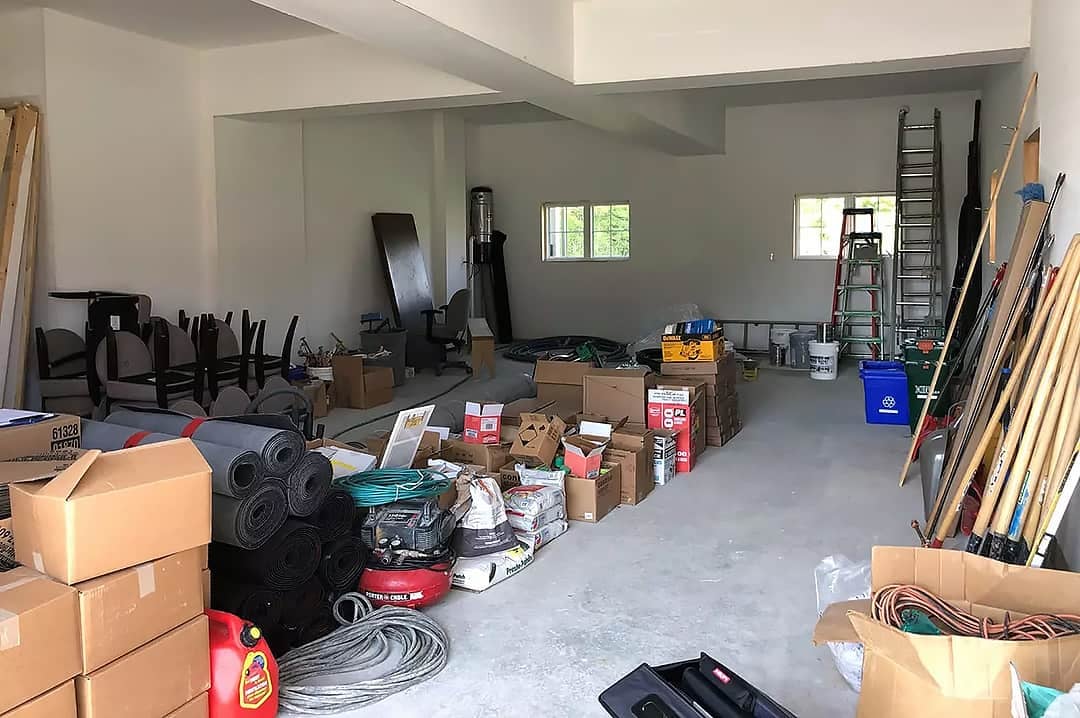 cluttered messy garage boxes