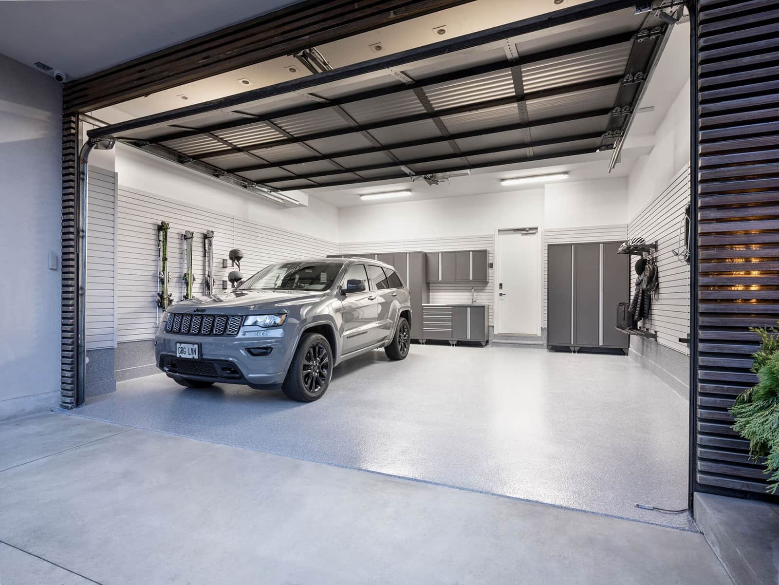 gray jeep in organized garage clean