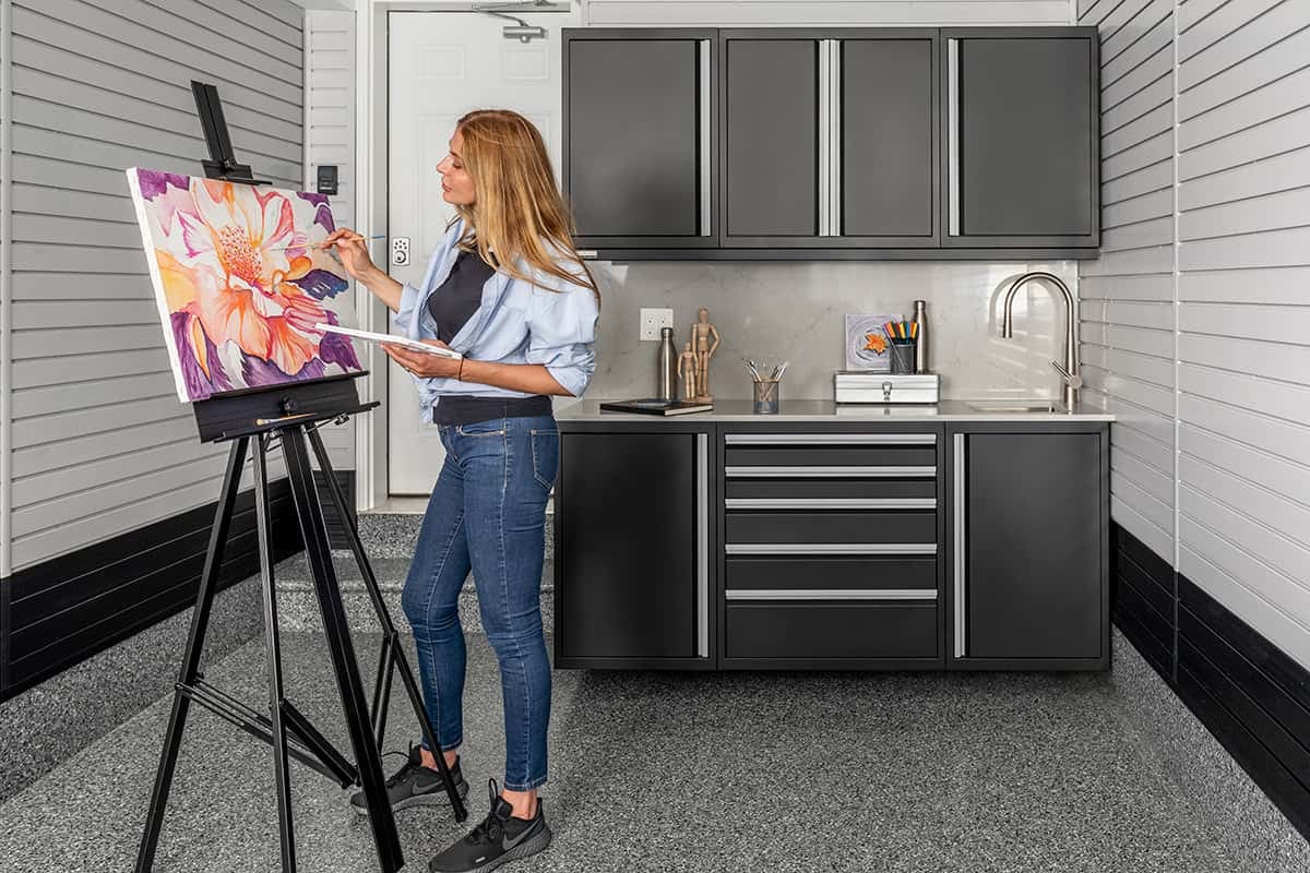 woman painting in her art studio