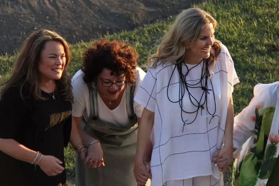 Charmaine enjoying a laugh with some local businesswomen.