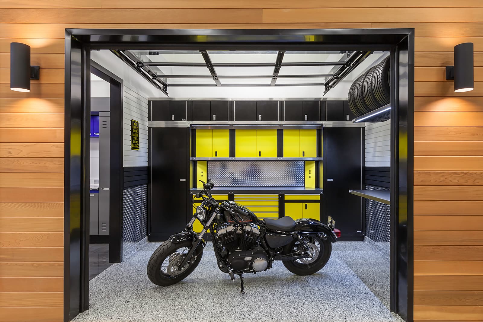 Garage Living Toronto Showroom with motorcycle
