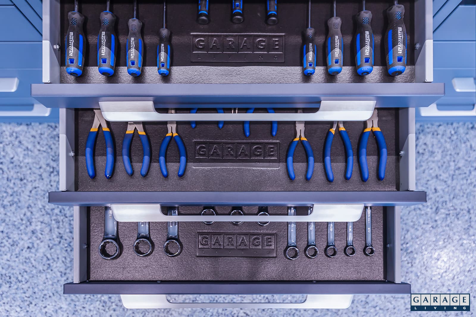 Harbor Blue Garage with Custom Steel cabinetry -slip resistant drawers - by Garage Living
