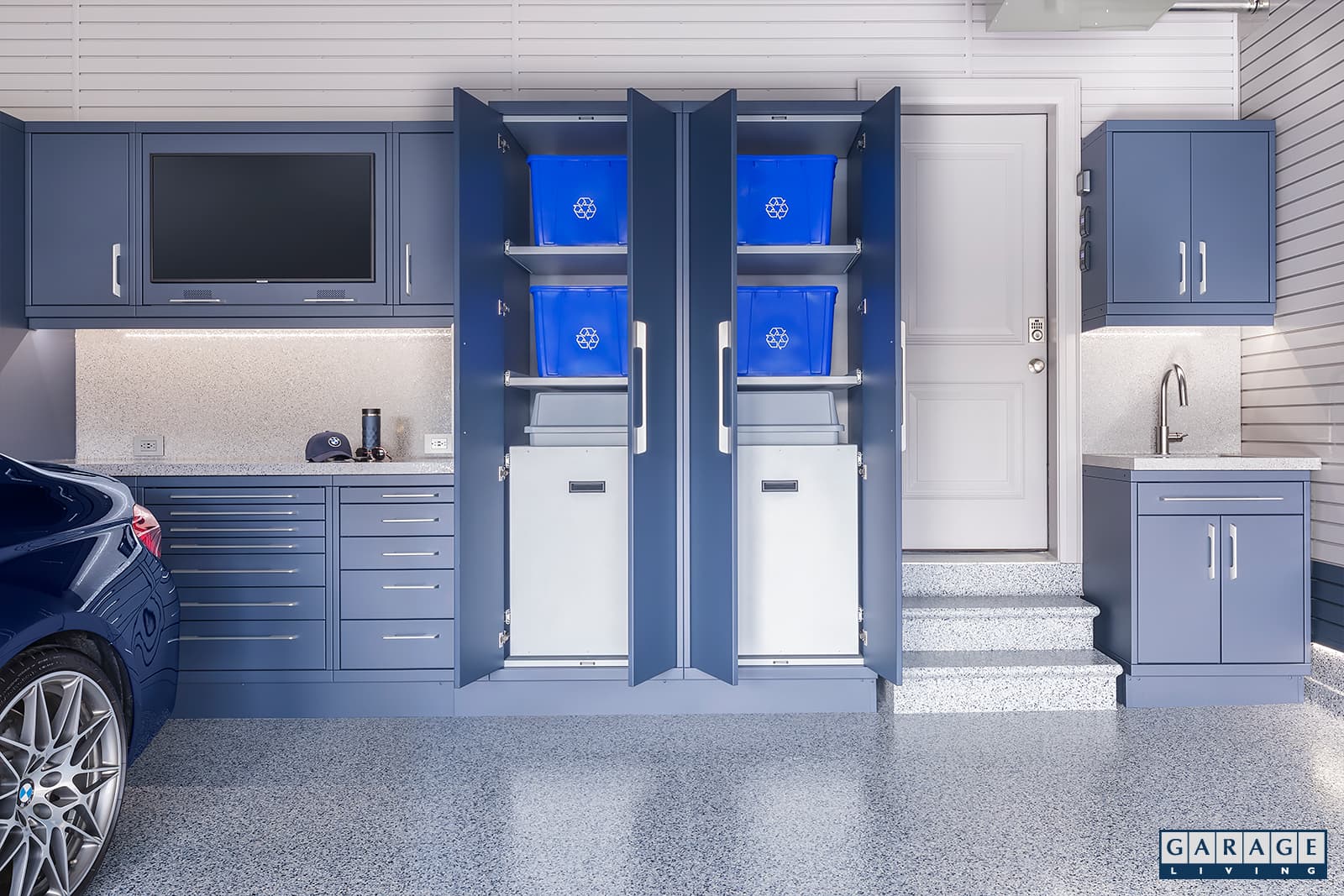 Harbor Blue Garage with Custom Steel cabinetry by Garage Living