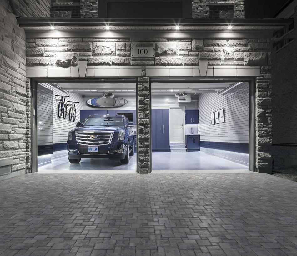After: GL Custom Steel cabinetry and Floortex® floor coating are in Harbor Blue. LED lighting (mounted under the slatwall panels) turn on when the garage door opens providing a nice custom touch.