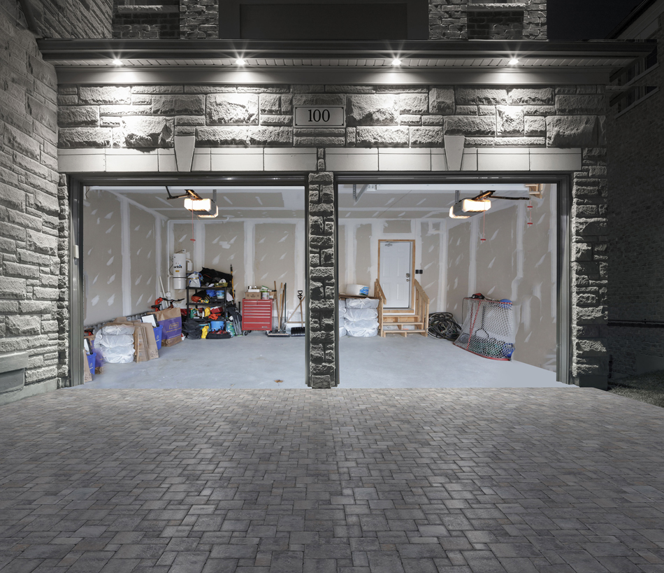 Before: Unfinished two-car garage in a new home.