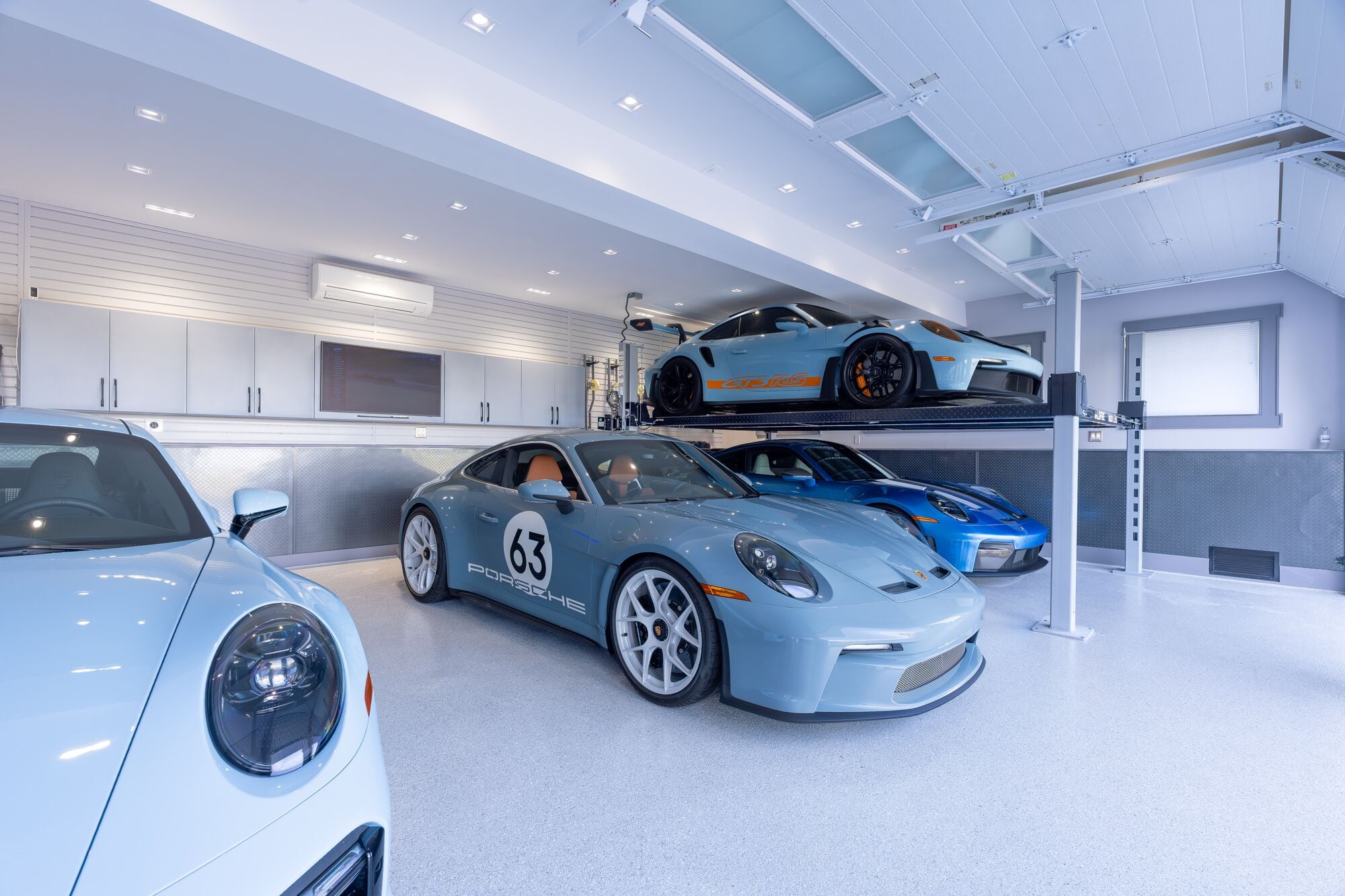 Discover the small garage design details that make everyday life easier, from hockey gear and car care to gardening and seasonal storage.