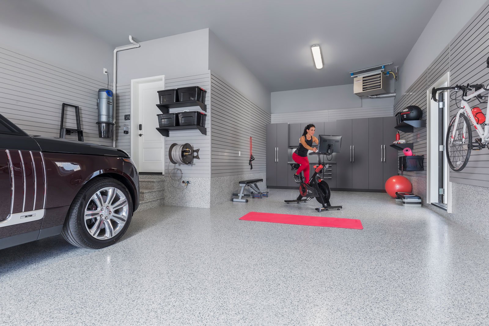 xwoman-exercise-bike-fitness-room-garage.jpg.pagespeed.ic.s5WG8gV5Vt